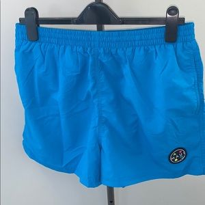Lined swim shorts with pockets